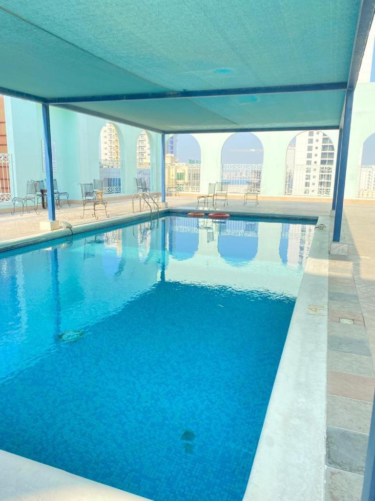 Blue Horizon Suites Manama Exterior photo